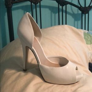Like new white set of Aldo heels with a peep toe